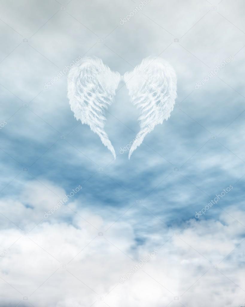 Angel Wings in Cloudy Blue Sky