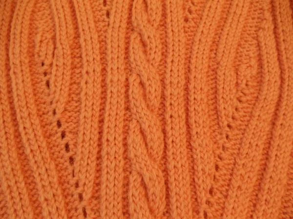 Close-up. Woolen handmade knitted fabric with a seamless pattern. — Stock Photo, Image