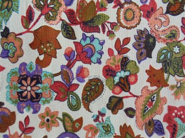 arka plan. Yazdırılan sorunsuz masal çiçek desenli doğal keten kumaş. yakın çekim.