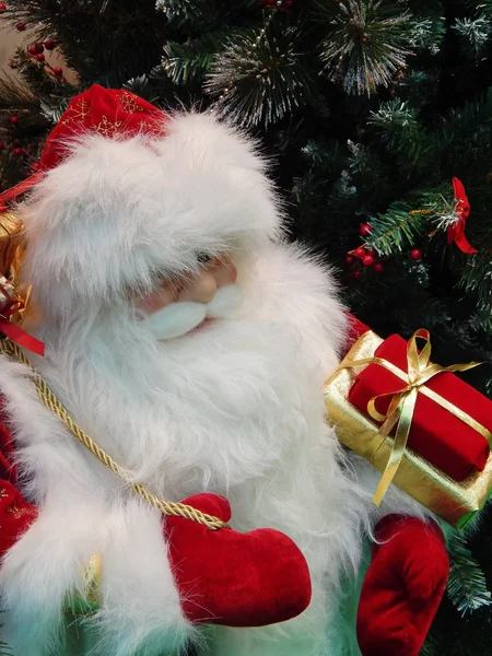 Święty Mikołaj z pudełkiem prezentów. Obraz Stockowy
