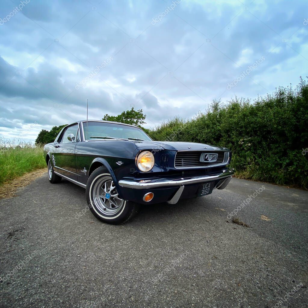 Low level front threequarter view of a stunning 1966 Mustang coupe