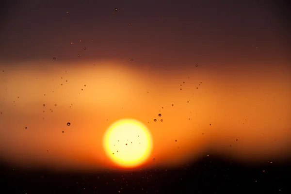 Pôr do sol chuvoso Fotos De Bancos De Imagens Sem Royalties