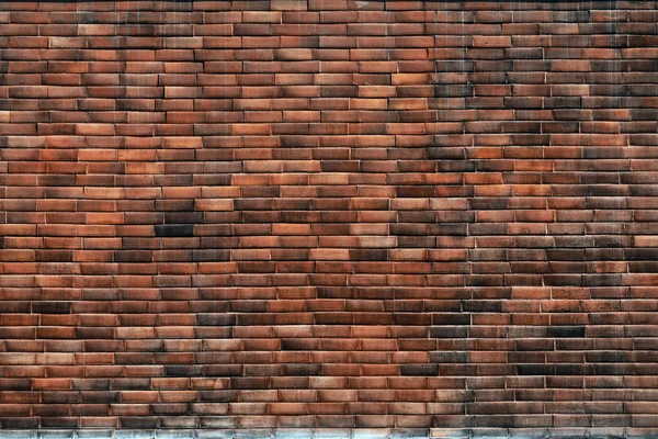 Mauer aus roten Ziegeln — Stockfoto