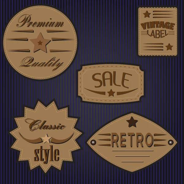 Set of vintage design labels and badges. — Stock Vector