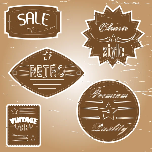 Set of vintage design labels and badges. — Stock Vector