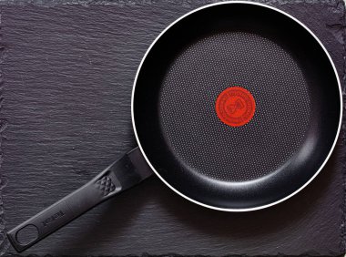Rumilly, France - October 15, 2021: Closeup of Tefal frying pan clipart
