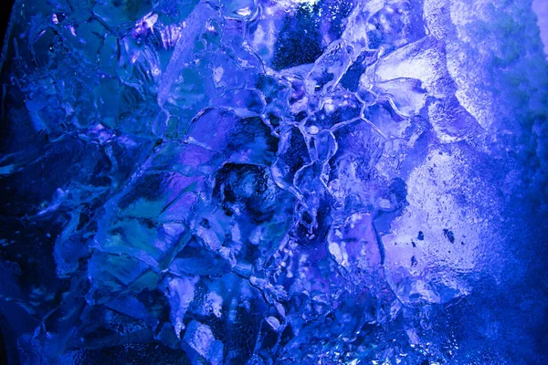 Крупный План Льда Красочной Подсветкой Дизайнерских Целей Текстурированный Фон — стоковое фото