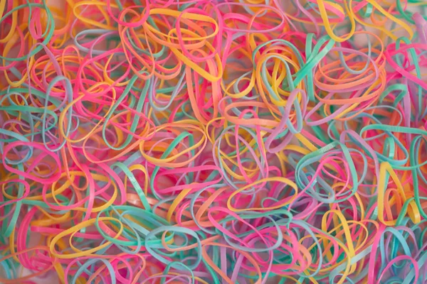 small and multicolored rubber bands accessories background for design purpose