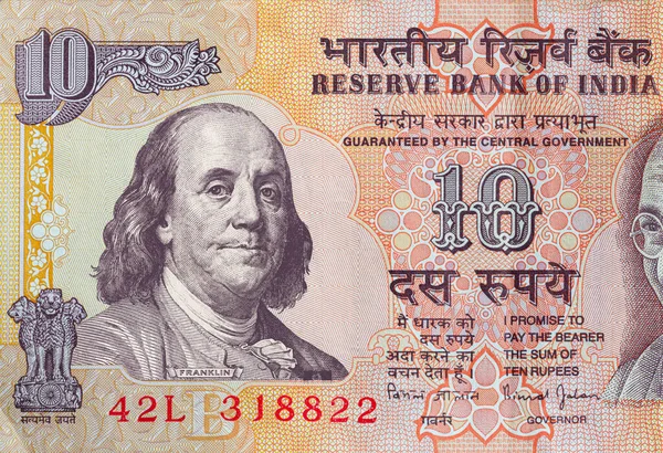 Old Indian Rupee Obverse Superimposed Benjamin Franklin 100 Dollar Banknote — Stock Photo, Image