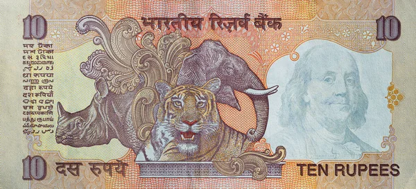 Old Indian Rupee Reverse Superimposed Benjamin Franklin 100 Dollar Banknote — Stock Photo, Image