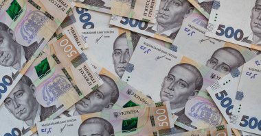 100 dollar and  500 hryvnyas banknotes background for design purpose