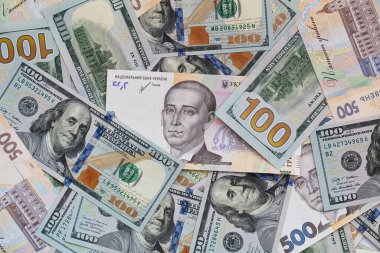100 dollar and  500 hryvnyas banknotes background for design purpose