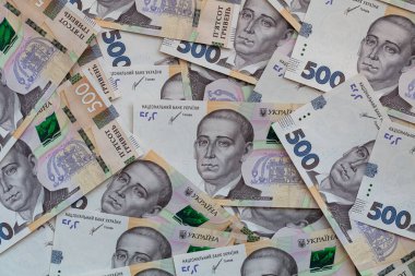 100 dollar and  500 hryvnyas banknotes background for design purpose