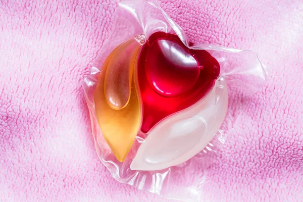 laundry detergent podo pink background for design purpose