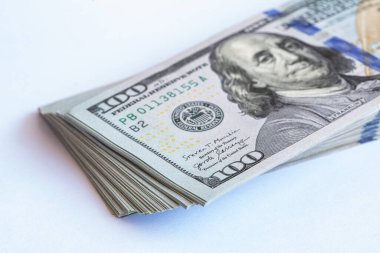 Pile of 100 dollar banknotes on white background for design purpose