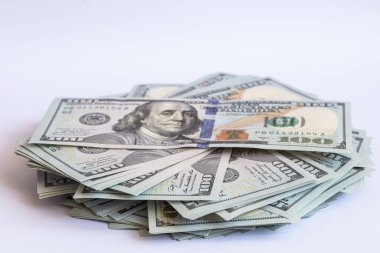 Pile of 100 dollar banknotes on white background for design purpose