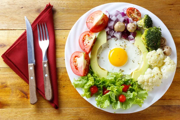 Ketogenic Paleo Diet Plate Avocado Salad Eggs Rustic Wooden Table —  Fotos de Stock