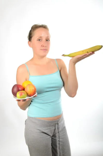 La chica con fruta fitness Imagen de stock