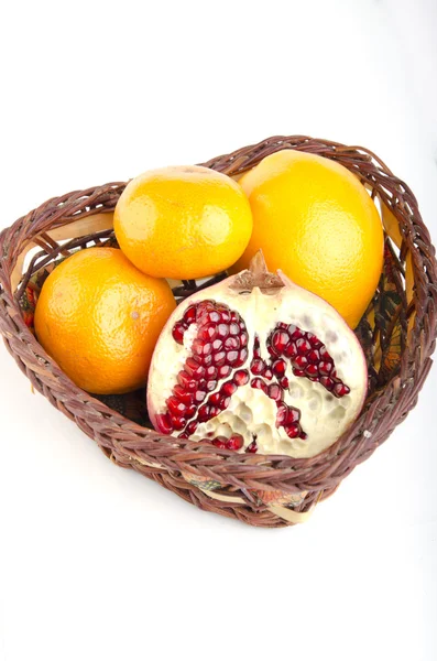 Oranges with pomegranate — Stock Photo, Image