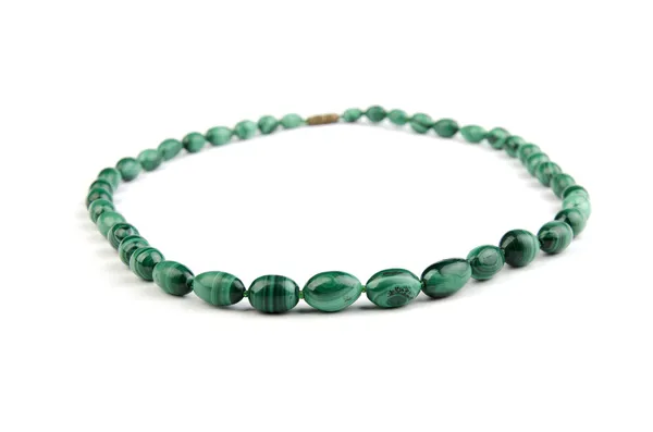Beads, necklace from malachite on white — Stock Photo, Image