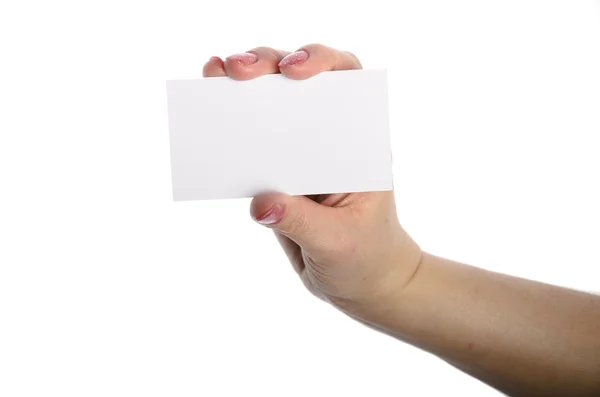 Close-up of an empty business card in a woman's hand isolated on white — Stock Photo, Image