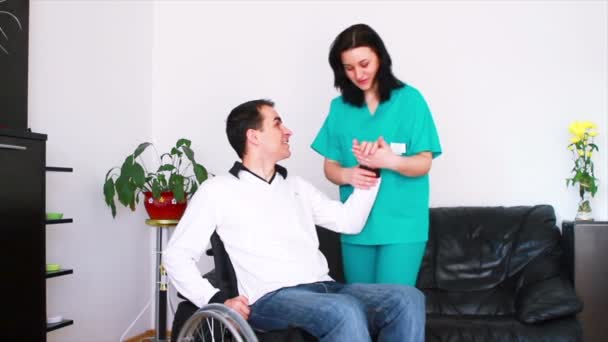 Physical therapist working with patient — Stock Video