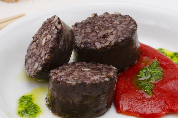 Іспанської кухні. morcilla де Бургос. кров'янка. Стокове Зображення