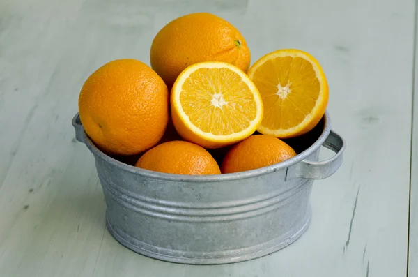 Oranges in a bucket. — Stock Photo, Image