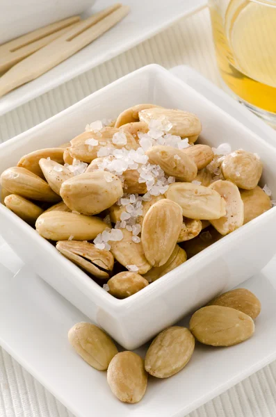 Spanish Cuisine. Toasted almonds in salt — Stock Photo, Image