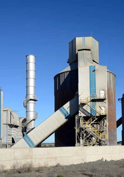 Cement factory towers — Stock Photo, Image