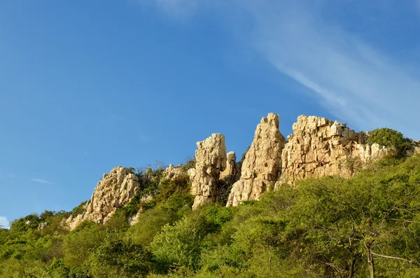 Rock by cliff — Stock Photo, Image