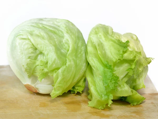 Iceberg lettuce on wooden — Stock Photo, Image