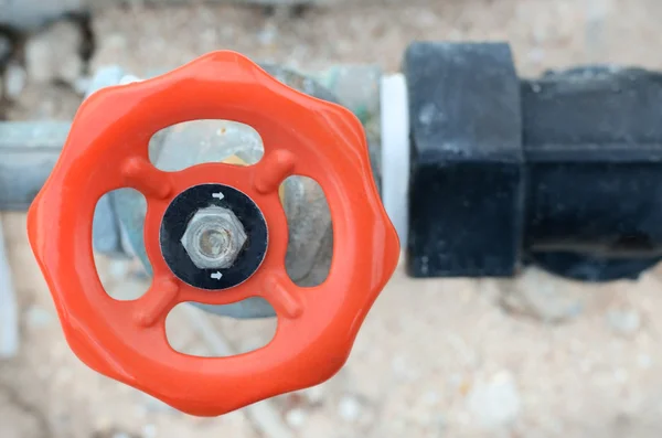 Orange water valve and steel pipe — Stock Photo, Image