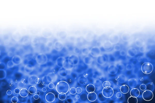 Abstrakte Unschärfe und Blase auf blauem Hintergrund — Stockfoto