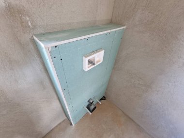 Drywall plaster sheets fixed as cover of hiden toilet