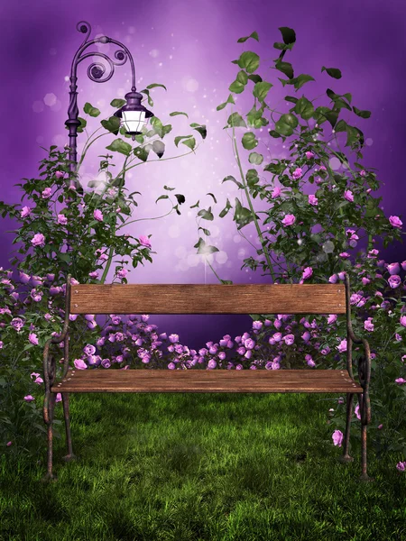 Jardim roxo com um banco — Fotografia de Stock