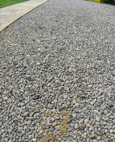Gravel path texture. ROad made wit crushed stone. Pebble texture