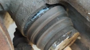broken brake piston. Car disc brake repair. Vehicle service. Replacing parts by a mechanic