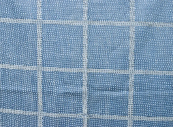 Blauwe gecontroleerd stof achtergrond of textuur — Stockfoto