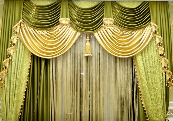 Green curtains on the window — Stock Photo, Image