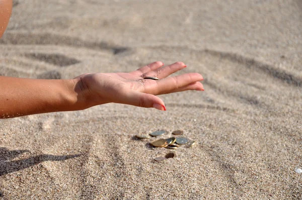 Money in the sand — Stock Photo, Image