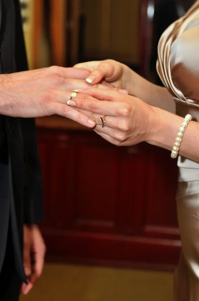 Woman wears a man ring