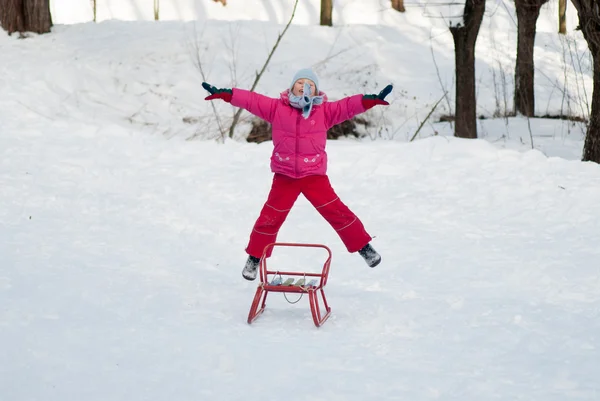 Girl sledding — Stock Photo, Image