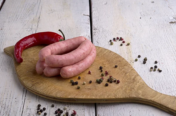 Klobása, pepře a chilli — Stock fotografie