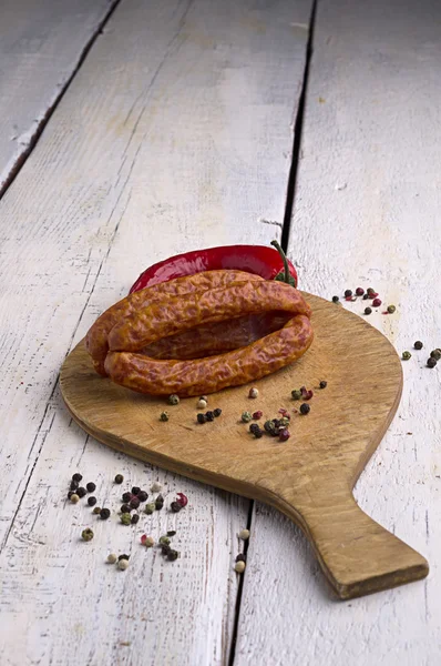 Sausage, peppercorns and chili — Stock Photo, Image