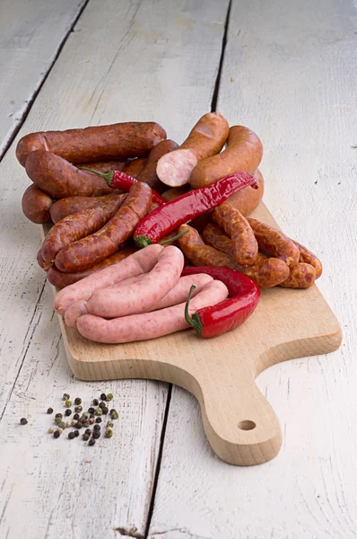 Sausage, peppercorns and chili — Stock Photo, Image