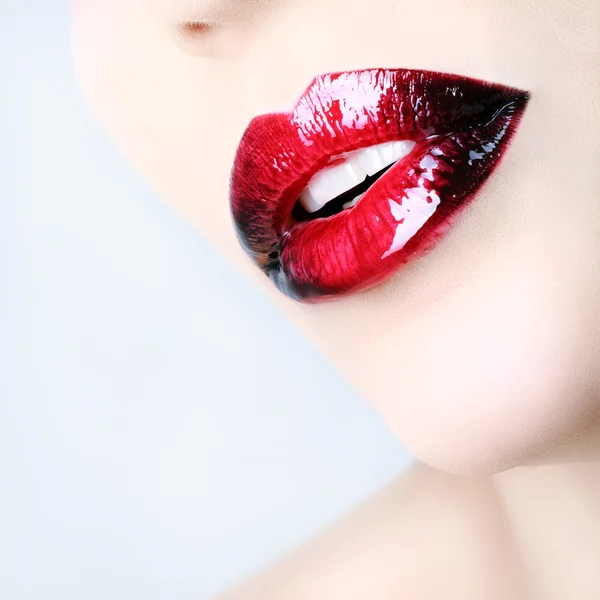 Passionate red shiny lips — 图库照片