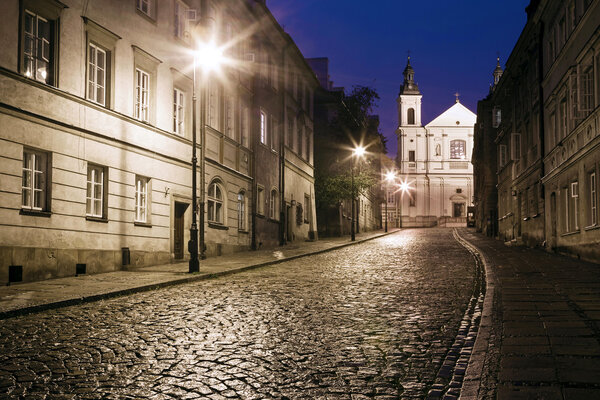 The street of the old town in Warsaw at night