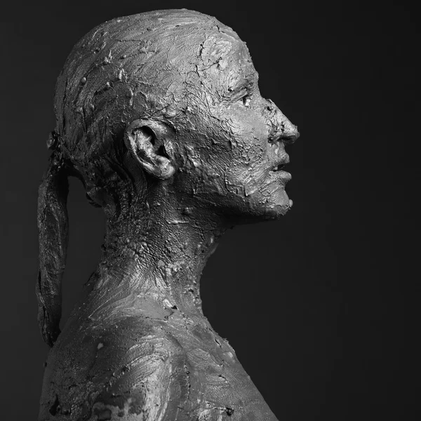 Mujer escultural en arcilla Imágenes de stock libres de derechos
