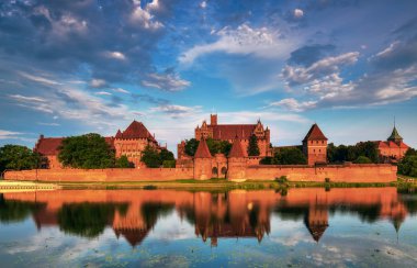 Teutonic Knights in Malbork castle in summer. World Heritage List UNESCO clipart